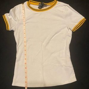 White top with colored collar and sleeve